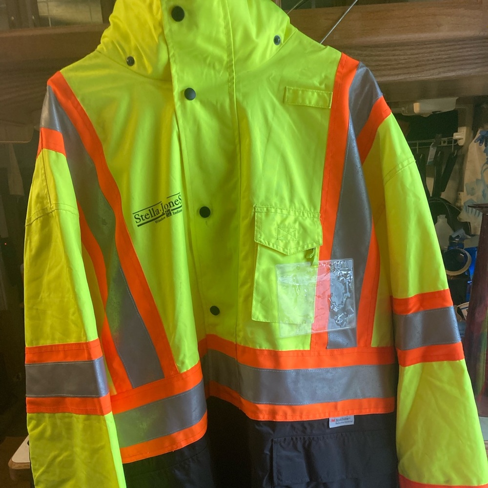 visibility enhanced apparel rain jacket